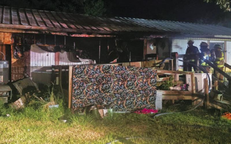 CADE LAKE AND Caldwell firefighters respond to this trailer home fire on Friday at Cade Lake. The home suffered major damage. Photo courtesy of Caldwell Volunteer Fire Department