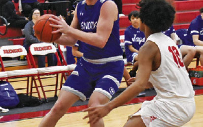 SNOOK’S BRAYDEN Macik moves in for a shot against Bremond last Friday. Tribune photo by Roy Sanders