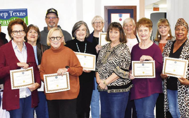 ELECTION VOLUNTEERS RECOGNIZED and presented certificates include, from left, Caprice Wright, Delfino Orozco, Doris Sebesta, Maggie Orozco, Tim Zaskoda, Mary Ann Rogers, Vi Griffin, Lou Pruett, Lisa Blum, Barbara Sodolak, Rosalie Stefka, Karen Bolt, Deborah Blake, Amber Freeman and Kim Drake. -- Tribune photo by Roy Sanders