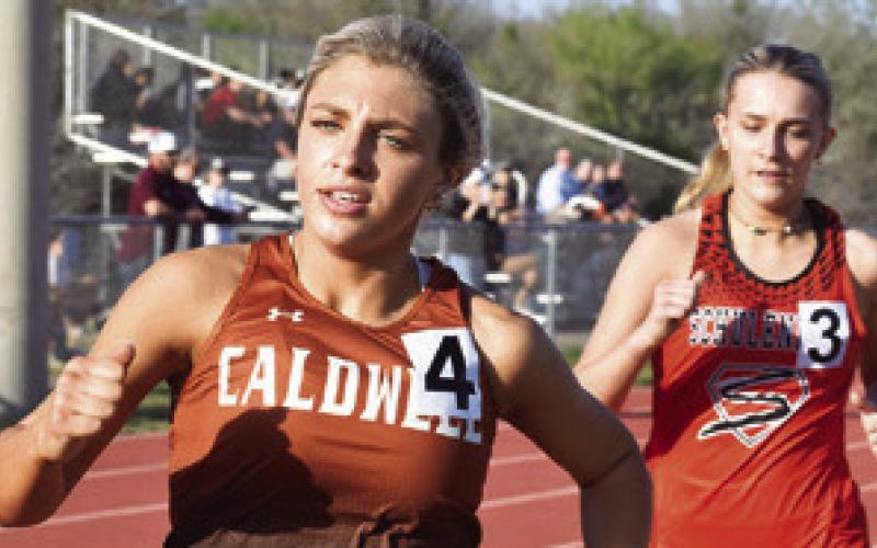 CALDWELL’S MADDY FAUST runs in the girls 1,600-meter run at last week’s Kopper Relays in Somerville. Tribune photo by Roy Sanders