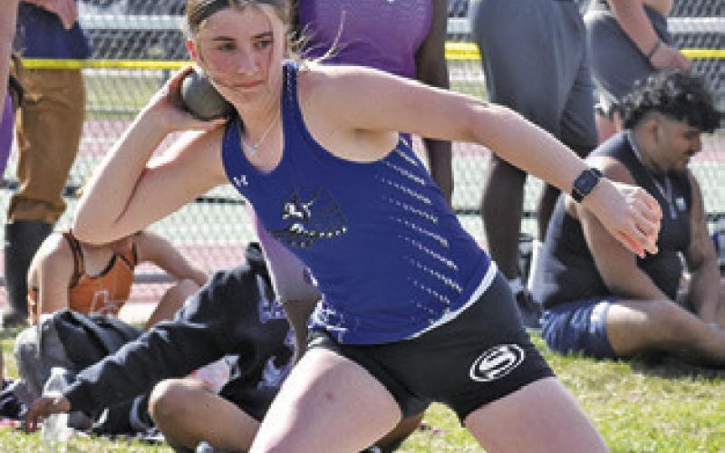 KILEY PRICE sets to throw the shot put during last week’s Kopper Relays in Somerville. Tribune photo by Roy Sanders