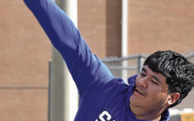 ROMERO MARTINEZ releases his shot put throw at Thursday’s Kopper Relays. Tribune photo by Roy Sanders