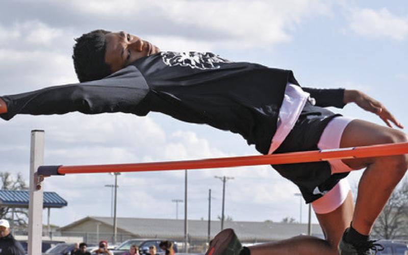 SOMERVILLE DOMINATED the boys high jump competition at this year’s Koppers Relays in Somerville. Tribune photo by Roy Sanders SOMERVILLE’S KEVIN GAINES and Semaj Pennygraph leap over hurdles during last Thurday’s Kopper Relays in Somerville. Tribune photo by Roy Sanders