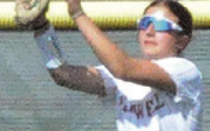 JAIDEN DOONAN catches a fly ball in the outfield during the Caldwell-Ingleside game on Thursday afternoon at Weiss Field. Tribune photo by Denise Squier