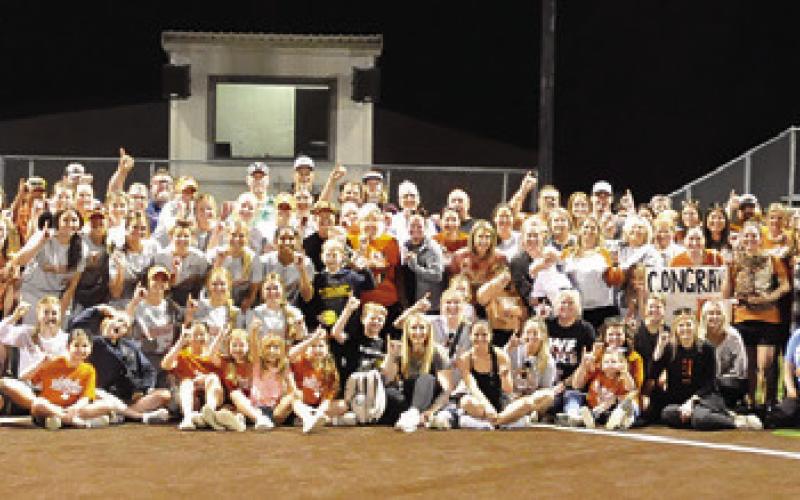 CURRENT AND FORMER LADY HORNETS, Caldwell ISD staff and Caldwell residents honored Wendy Weiss at Friday night’s home game -- her final home game coaching the Lady Hornets before she retires after 29 years. -- Tribune photo by Denise Squier