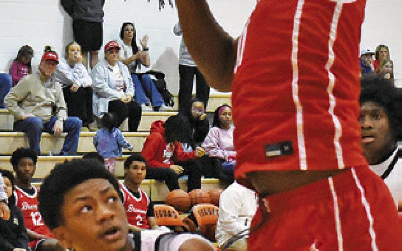 KEVIN GAINS OF Somerville gets ready to shoot against Bremond in last Friday’s game in Somerville. The Yeguas lost 56-28. Tribune photo by Roy Sanders