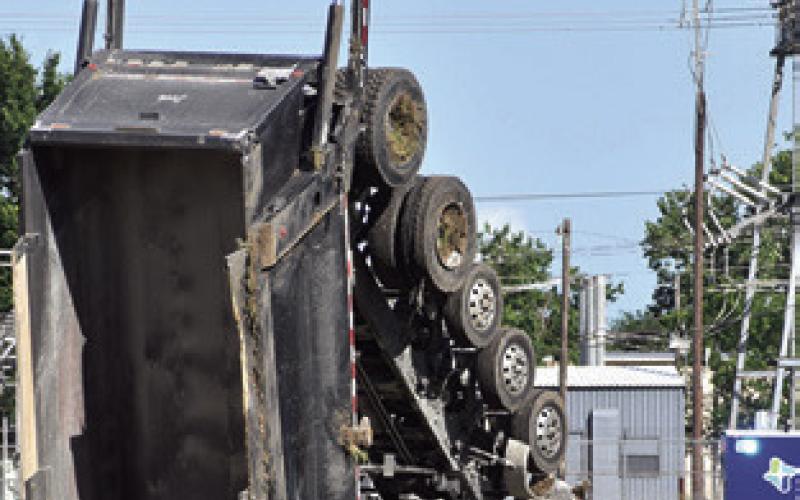 FIREFIGHTERS RESPOND to the scene of this Friday, June 6, accident off State Highway 36 South. The driver was flown from the scene to Baylor Scott&amp;amp;White Hospital in Temple.