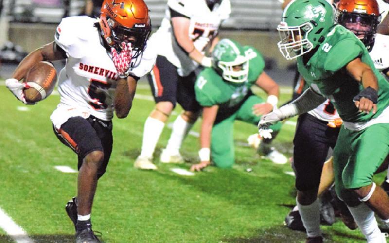 SOMERVILLE’S VERKOBE WOODBERRY returns an interception during the Yeguas’ bidistrict game against Eldorado last Thursday in Burnet. -- Tribune photo by Denise Squier