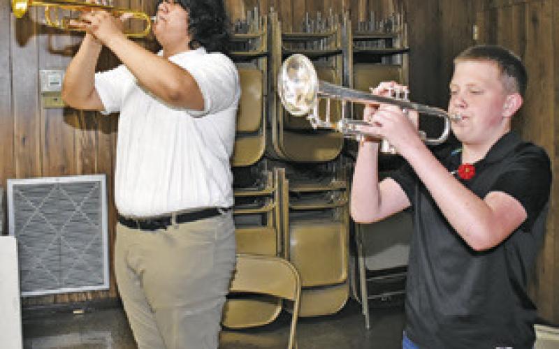 CALDWELL HIGH SCHOOL students Kevin Perez and Cooper Albrecht play “Taps” at the Memorial Day ceremony.