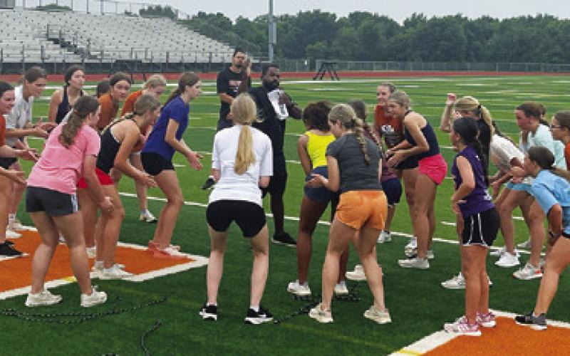 CALDWELL ISD GIRL STUDENTS are doing drills at Strength and Conditioning Camp.