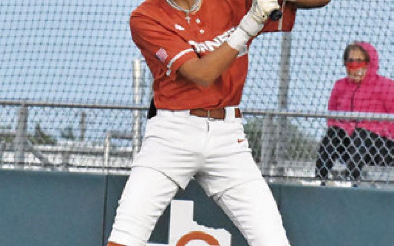 BLANE CASTANEDA bats for the Caldwell Hornets against Smithville.