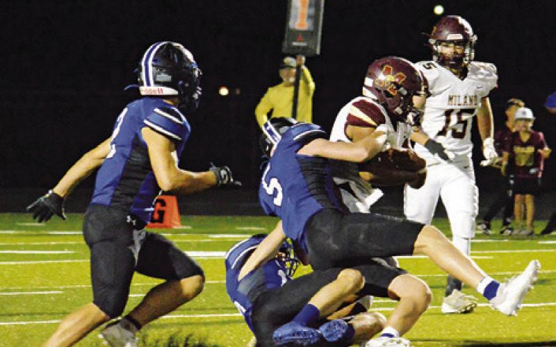 SNOOK’S BRAYDEN MACIK and Silas Hetland make a tackle. Tribune photo by Kim Hutcheson