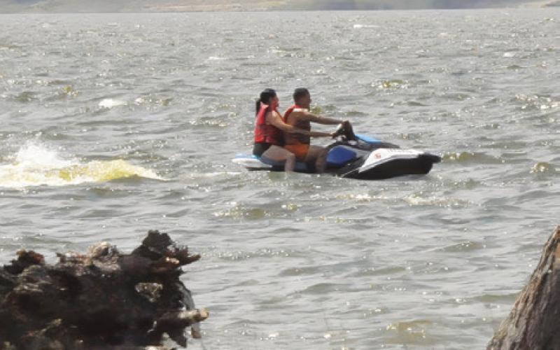 PEOPLE ENJOYED JET SKIING during Memorial Day weekend. Tribune photo by Denise Squier