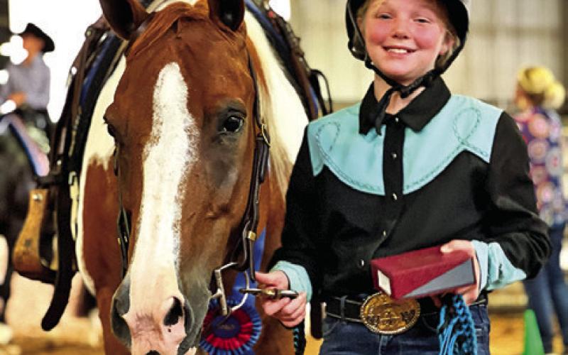 HEZA HUGABLE JET of Caldwell after winning his fourth world championship of the show with Rose McIlrath of Austin. Photo courtesy of Lazo Performance Horses