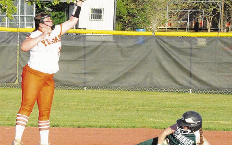 SOMERVILLE LADY YEGUA Aubrey Kovasovic reaches for the throw to attempt to tag out a Normangee player sliding into second.
