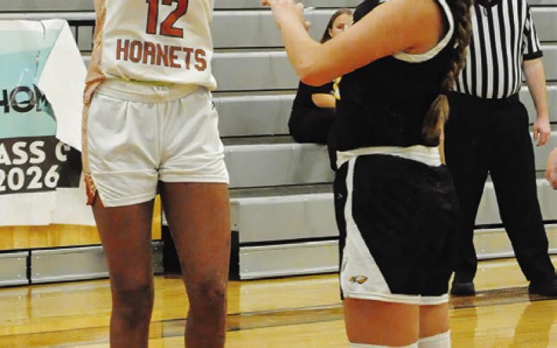 CALDWELL’S TYNIAH JOHNSON shoots the ball over a Bruceville-Eddy player during the Lady Hornets’ game against the Lady Eagles last Monday at Hornet Gym. -- Tribune photo by Denise Squier