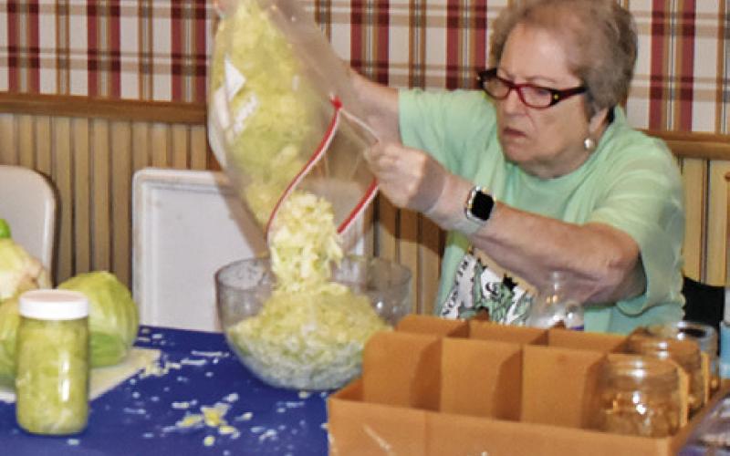 LAURIE GAAS WORKS at the Burleson County Czech Museum’s annual Heritage Day on Saturday, March 28.