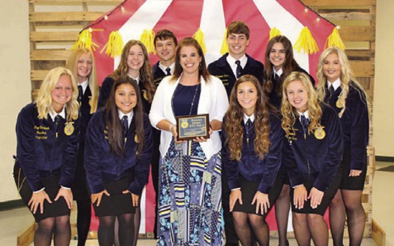 CHRISTINE VOGLER IS PICTURED with Caldwell High School FFA officers receiving an Honorary Chapter FFA Degree. Photo courtesy of Danielle Hicks