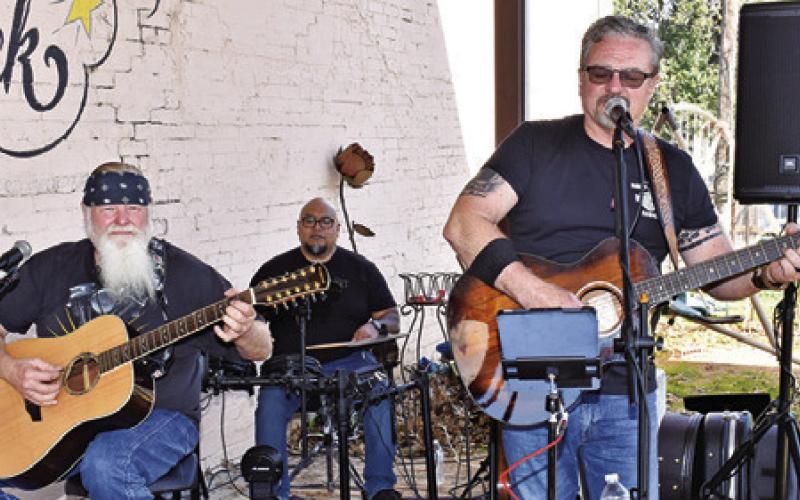 LIVE MUSIC BY RED DIRT RAMBLERS during the Chocolate, Champagne, and Cake Walk event. Tribune photo by Roy Sanders