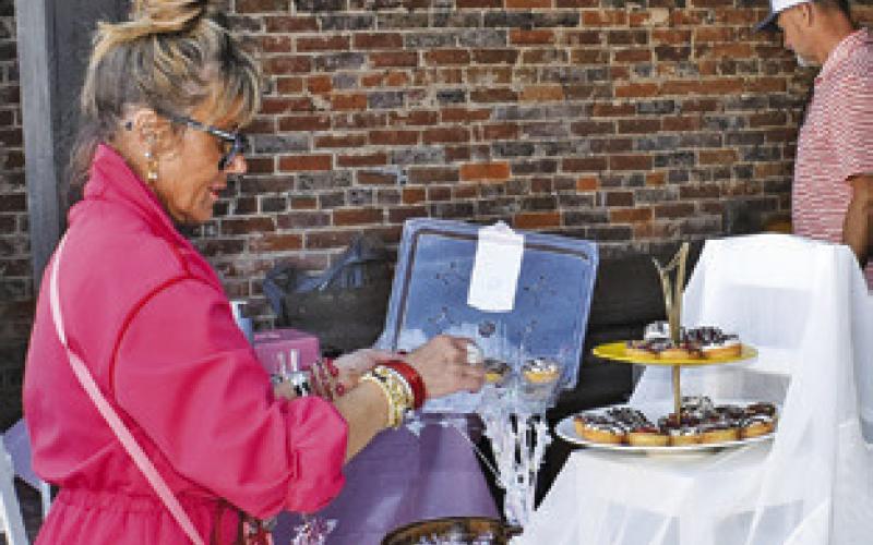 SOME OF THE TREATS ON display at the annual Chocolate, Champagne, and Cake Walk. Tribune photo by Roy Sanders