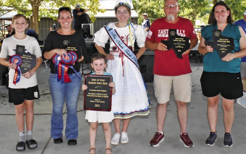 KOLACHE FESTIVAL BAKING grand champions included, from left, Shane Kienow, youth, Cherisse Walker, non-professional state, Caroline Campbell of Jake’s Bakery, professional, Eric Muehlstein, kolache roll, and Nicole Godwin, non-professional, Burleson County. Joining them is Miss Kolache Festival Olivia Supak.