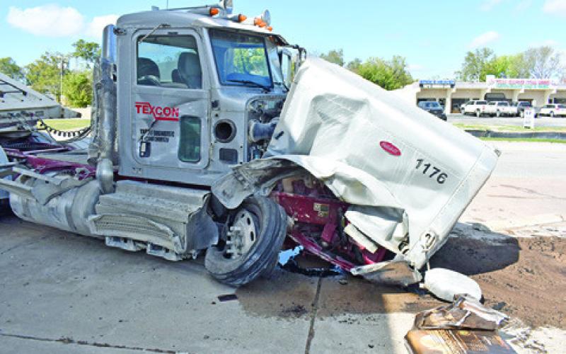 THIS TRUCK RIG was damaged on Friday, Nov. 14, in an accident on State Highway 21 near Thomas Street. See story page 3A. Tribune photo by Roy Sanders