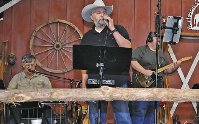 JOHN POLLOCK OF the Amazing Grace Band at Burleson County Cowboy Church performs on Thursday, Sept. 25, at the gospel concert.