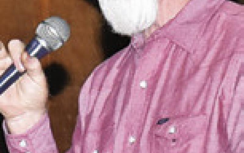 BILL KRISTOF shares a poem at the gospel concert on Sept. 25 at the Burleson County Cowboy Church in Caldwell.
