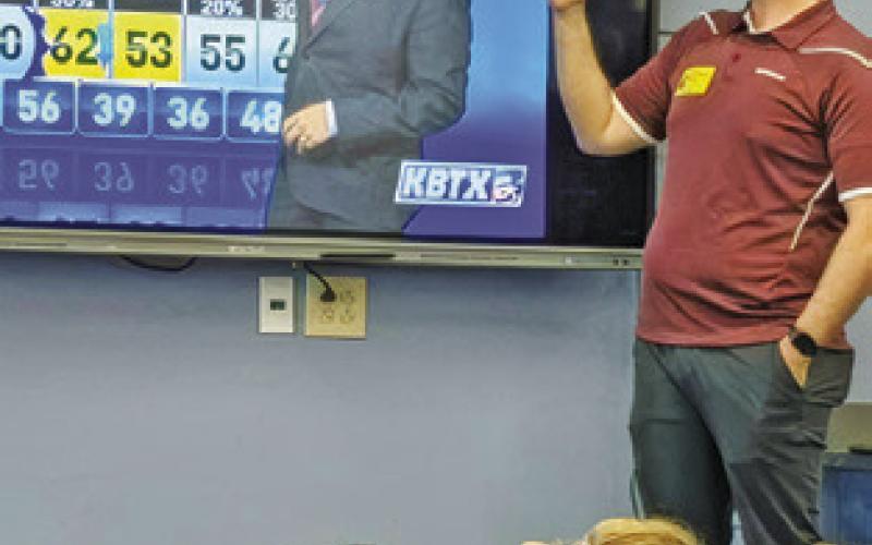 KBTX-TV METEOROLOGIST Max Crawford recently visited Snook Elementary School.