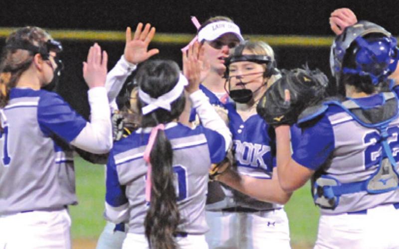 THE LADY JAYS CHEER EACH other on during their game against Anderson-Shiro last Friday in Snook. -- Tribune photo by Denise Squier