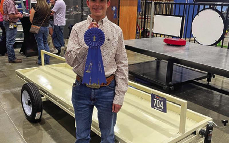 BRODY PRIHODA OF SNOOK FFA earned a blue ribbon in the Ag Mechanics contest at HLSR with his portable feed trough. Prihoda was also part of the Snook FFA Dairy Cattle Judging team that competed at HLSR, alongside Mabry Prihoda, Jaci’Lee Perze and Kennedi Withem. Photo courtesy of Nicole Godwin