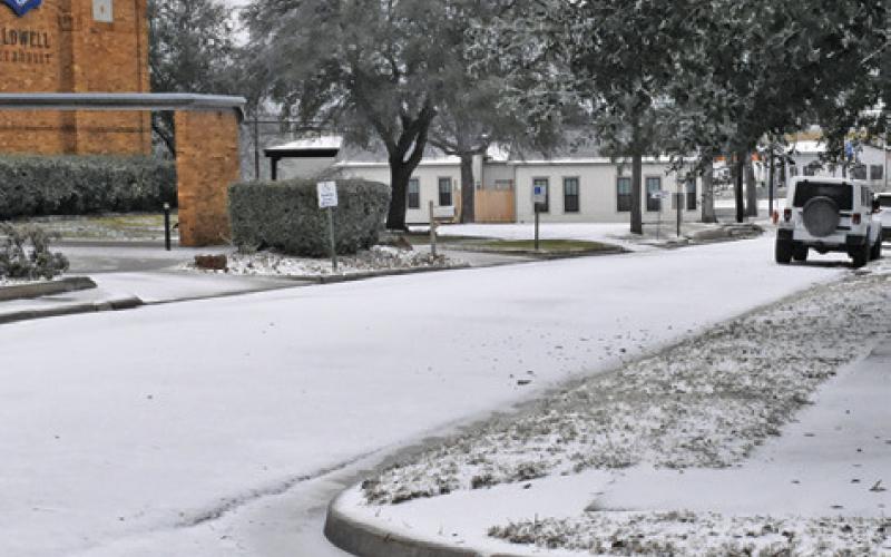CALDWELL RESIDENTS AWOKE to this site on Fox Street early Sunday, Jan. 25, in Caldwell. Temperatures dropped into the teens. Tribune photo by Roy Sanders