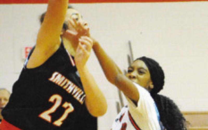 SOMERVILLE’S MARDAISA Snowden attempts to block a pass by a Smithville player.