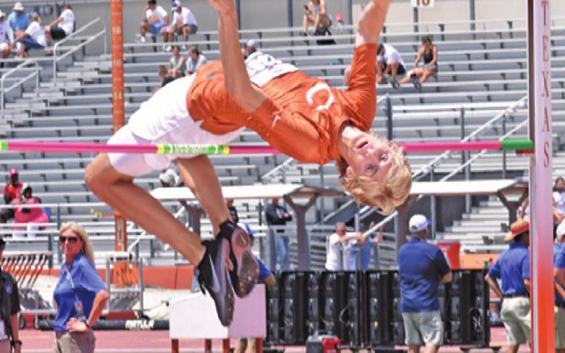 DANIEL COWAN JUMPS at the state track meet in Austin.