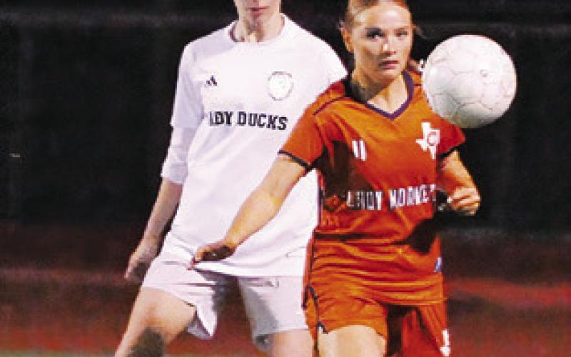 CALDWELL’S EMILY Kubicek-West gets possession of the ball during the Lady Hornets’ game against Taylor on Friday.