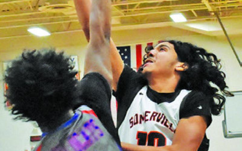 GARDNER SHIVERS of Somerville takes a shot against Temple JV at the tournament.