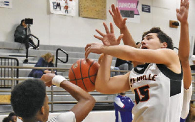 IRMAN SADIC OF Somerville fights for the ball against Temple JV at the Caldwell Tournament. -- Tribune photo by Roy Sanders