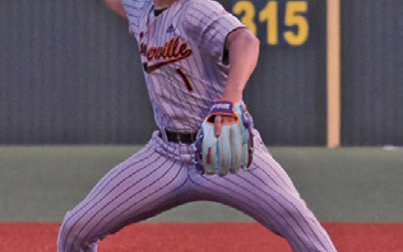 GREG FOWLER pitches for Somerville last Friday in a road loss to Mumford. Tribune photo by Roy Sanders