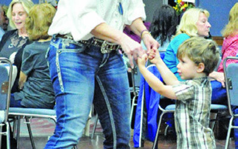 DANCERS OF ALL AGES enjoyed Saturday’s “Denim, Dinner &amp;amp; Dancing Gala,” hosted by the Caldwell Burleson County Lions Club. Tribune photo by Denise Squier