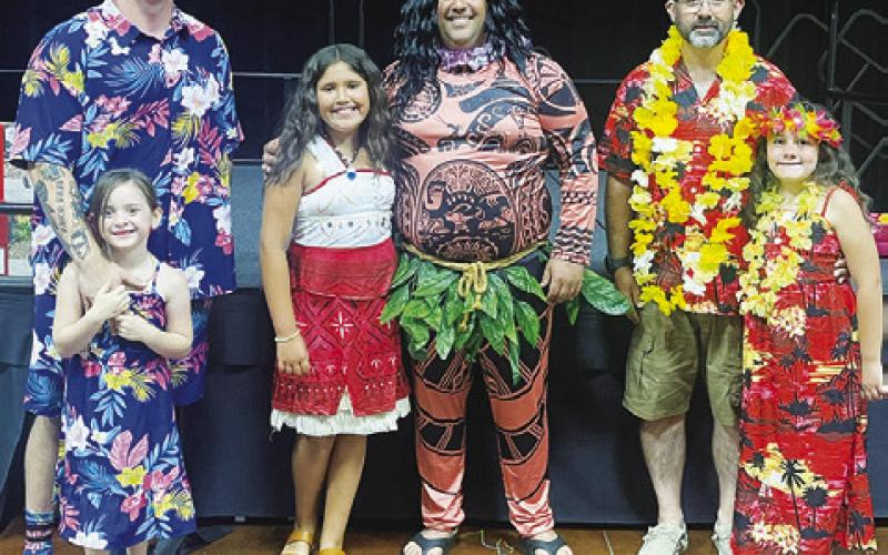 THE HAWAIIAN SHIRT CONTEST WINNERS from last Saturday’s Daddy Daughter Dance were: Max Vargas, second place; Rodrigo Segnini, first place; and Bart O’Donovan, third place.