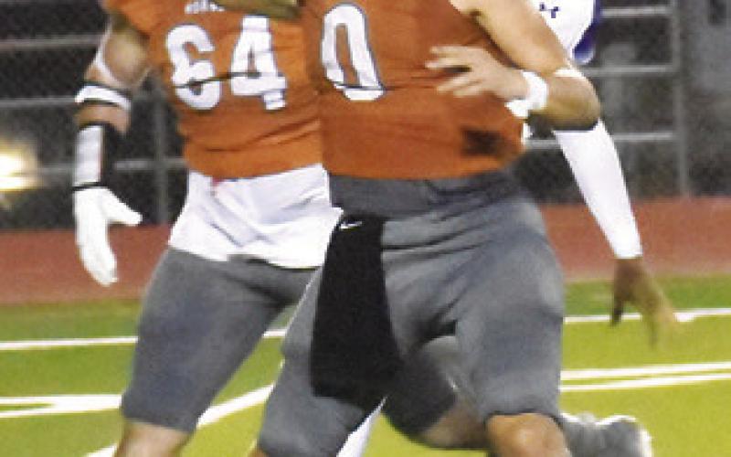 CALDWELL’S COY BECKA hurls this pass against Jarrell last Friday night.