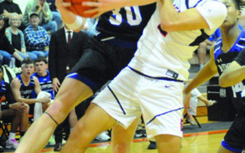 JAYDEN YOUNG OF Somerville reaches for the ball against Mumford last Friday in Somerville. The Yeguas lost 62-43. Tribune photo by Denise Squier