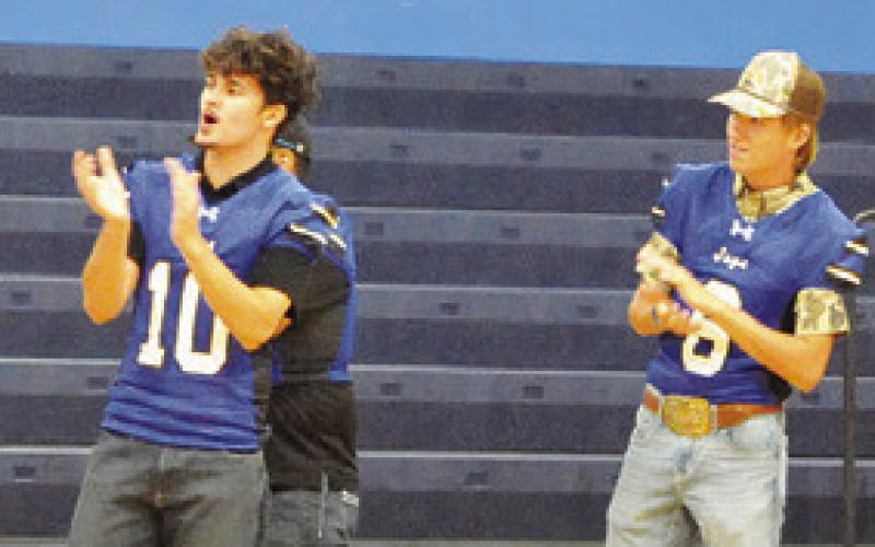 SNOOK BLUEJAY FOOTBALL players applaud for each other as each team member was announced during Monday’s “Meet the Bluejays.” Tribune photo by Denise Squier