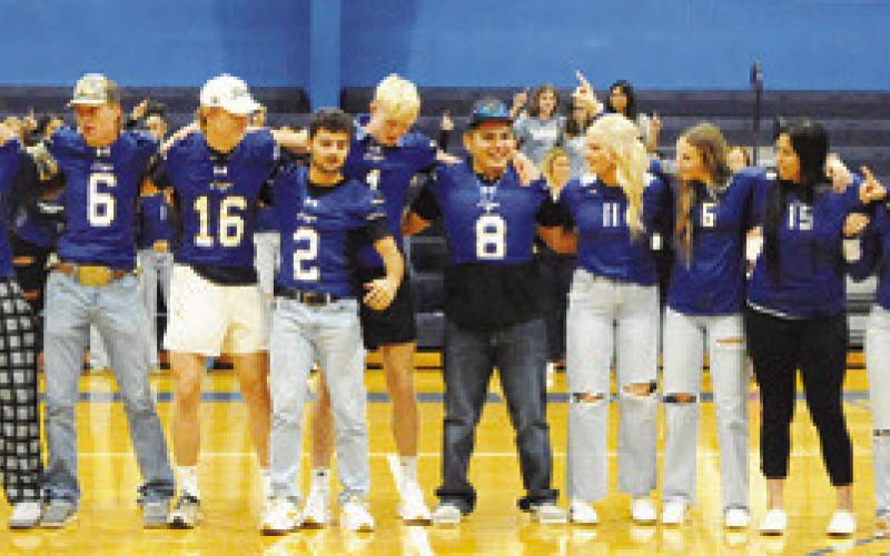 SNOOK SENIORS WERE HONORED during the playing of the school song at Monday night’s “Meet the Bluejays.” Tribune photo by Denise Squier