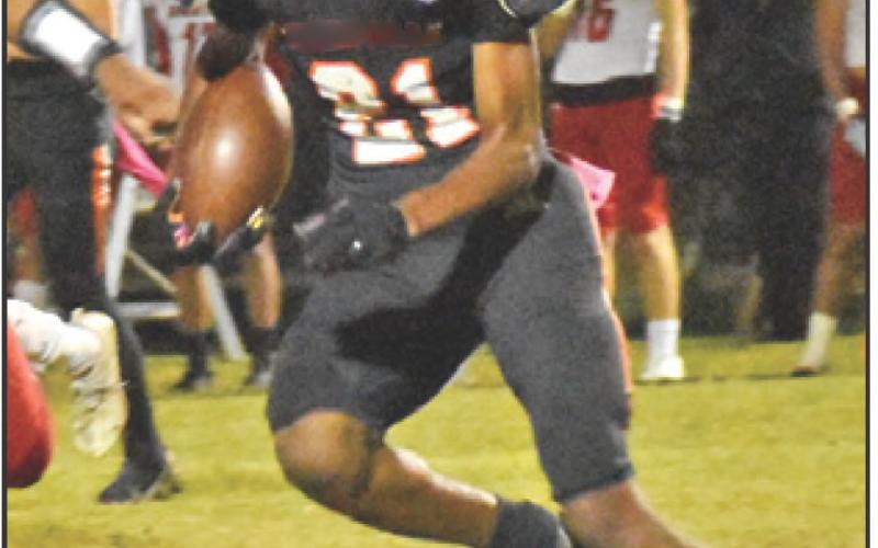 SOMERVILLE’S DOMINIC Tucker carries the ball against Burton. The Yeguas lost 71-20.