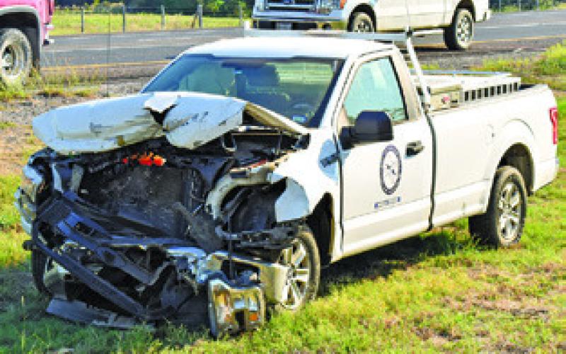 THIS CITY OF Caldwell truck was damage the Friday accident on State Highway 21 West and F.M. 908. Tribune photo by Roy Sanders