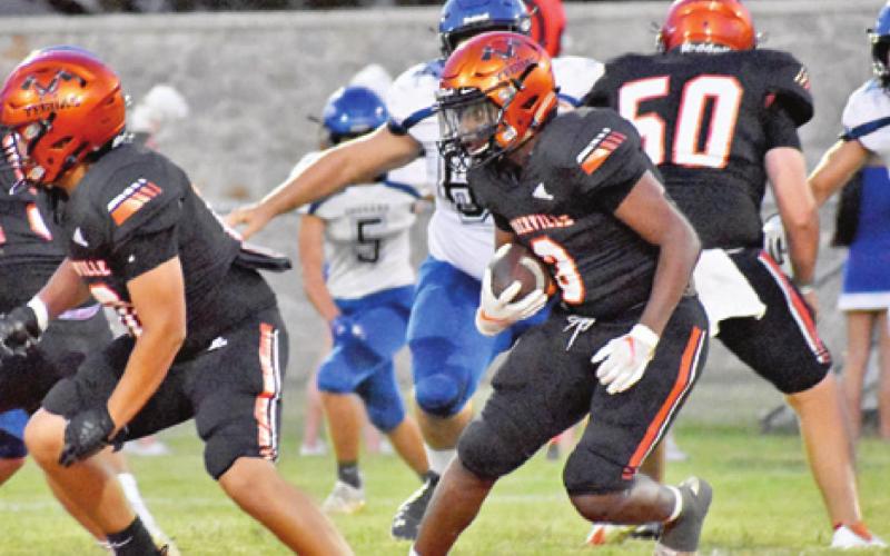 ARVIS BURNS CARRIES for Somerville against Jewett Leon.