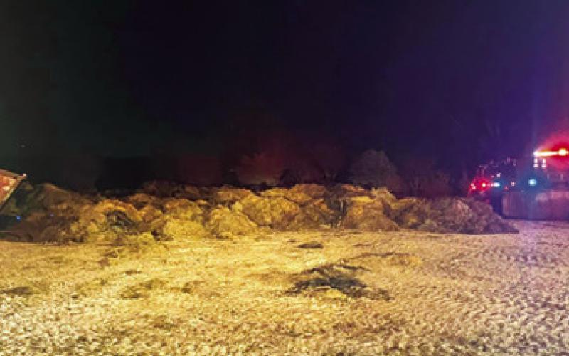 THESE HAY BALES were pulled out of the barn during the Oct. 30 fire off State Highway 21 East near Cooks Point. Photo courtesy of the Cooks Point Volunteer Fire Department