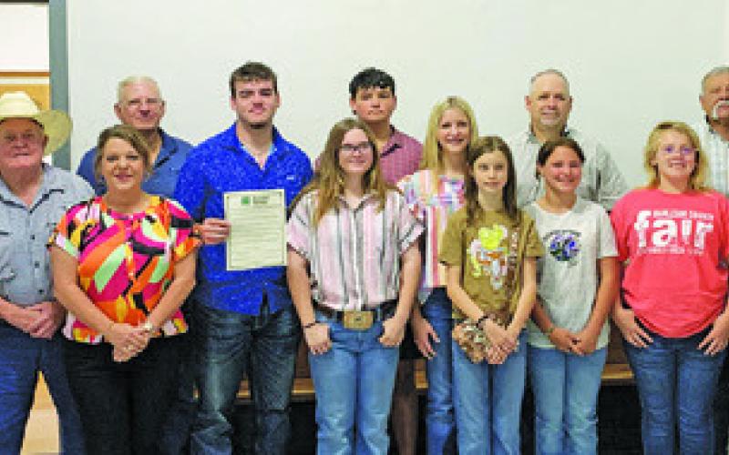 BURLESON COUNTY 4-H CLUB members join the Burleson County Commissioners Court at the commissioners Monday meeting to celebrate National 4-H Week.