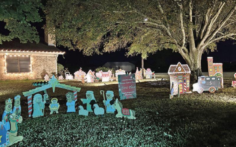 DAVID AND SHARON Sharon Kovar won first place in the residence category of Snook EEA’s “Christmas Lights of Snook.”